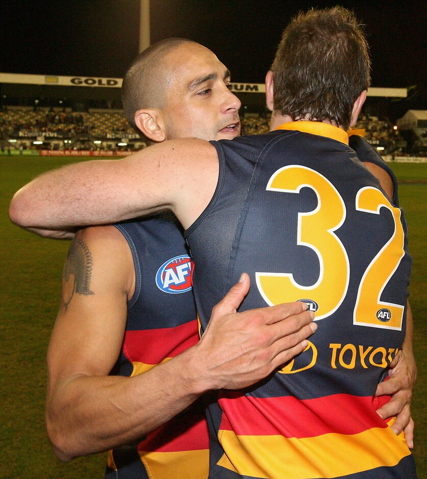 AFL Round 12 - Kangaroos v Adelaide Mark Ricciuto and Andrew Mcleod celebrate Adelaide's win in the AFL Round 12 match between the Kangaroos and Adelaide Crows at Carrara.